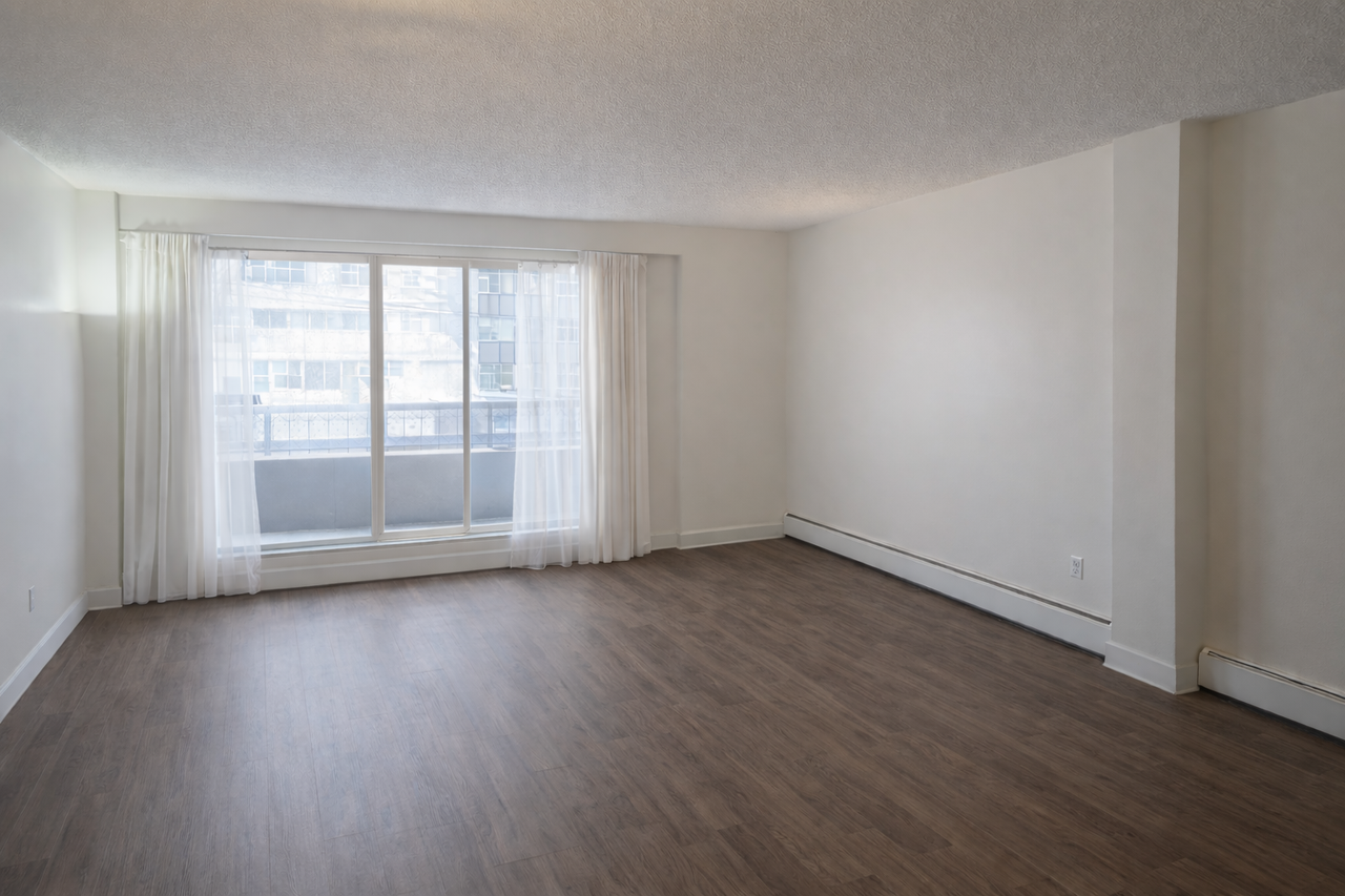 NEW FLOORING & PAINT! LARGE 2 BED/1 BATH APARTMENT IN MISSION! - Photo 2 of 14