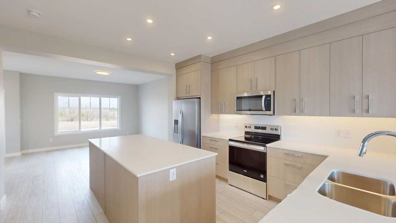 8749 Huxbury Dr Ne - Photo 2 of 20