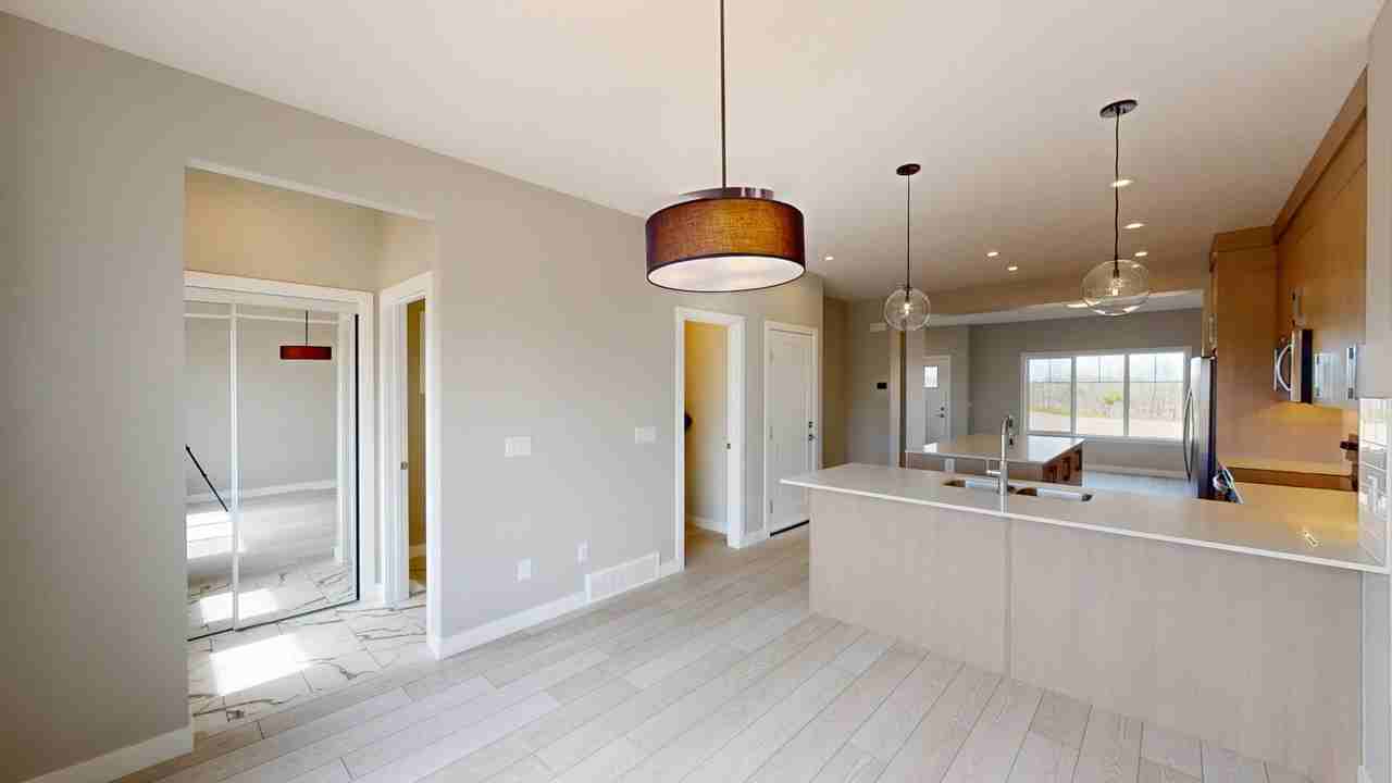 8749 Huxbury Dr Ne - Photo 3 of 20