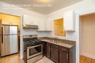 4959 N Albany Ave - Photo 1 of 1