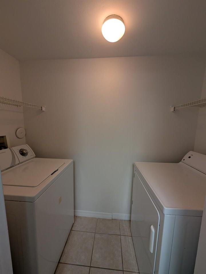 5001 Wiles Road #105 - Photo 5 of 5