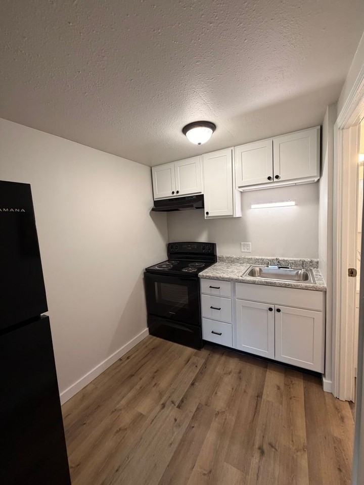 Newly Renovated Apartments Available NOW - Photo 3 of 5