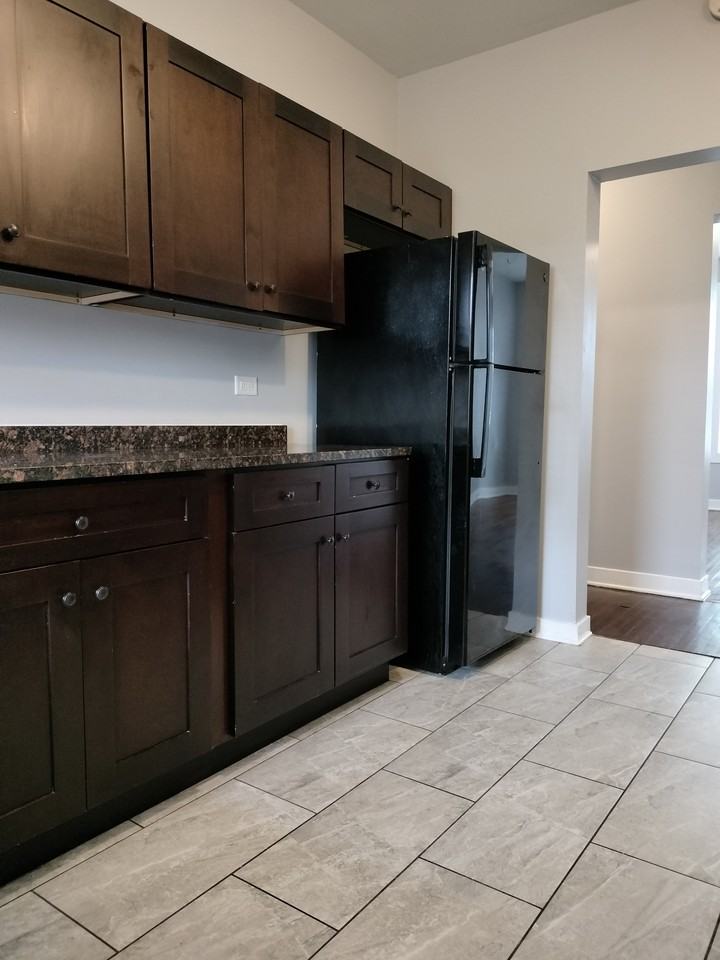 1415 W 66th St #1415-1 - Photo 3 of 17