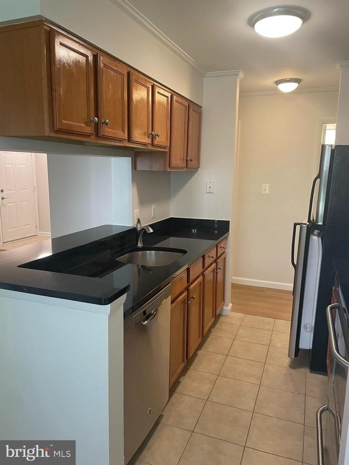 11704 Olde English Dr #K - Photo 2 of 16