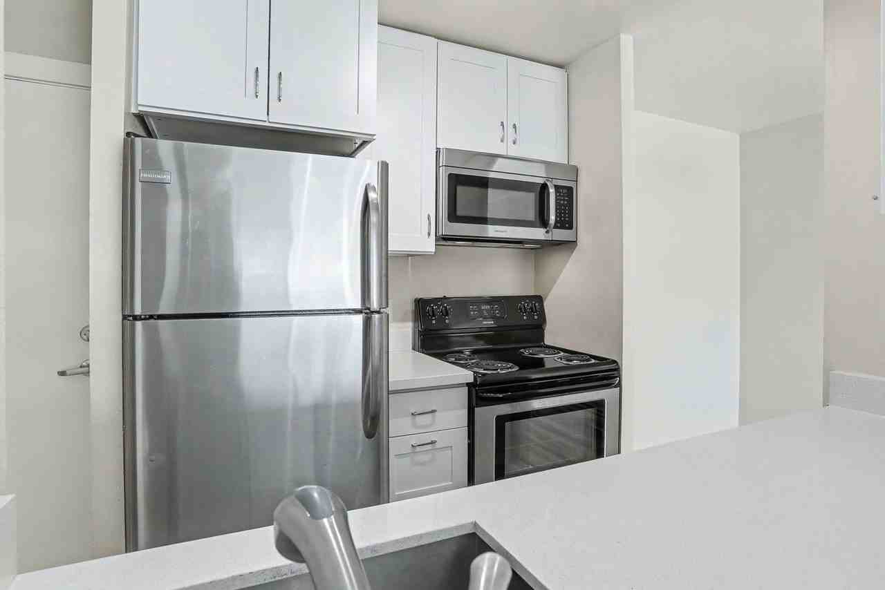 1221 Apartments - Photo 3 of 19