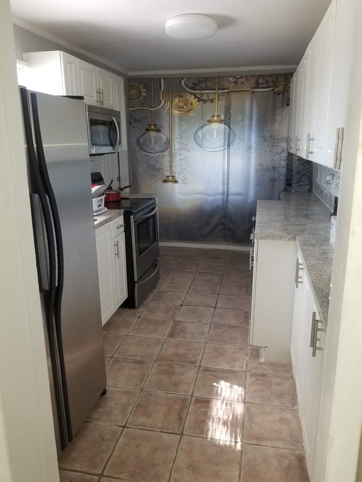 1069 W 30th St - Photo 5 of 9