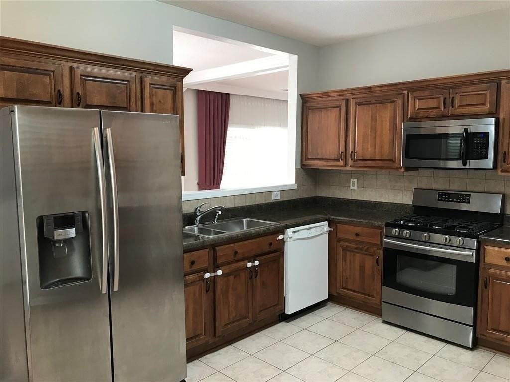 6135 Pattingham Dr - Photo 5 of 16