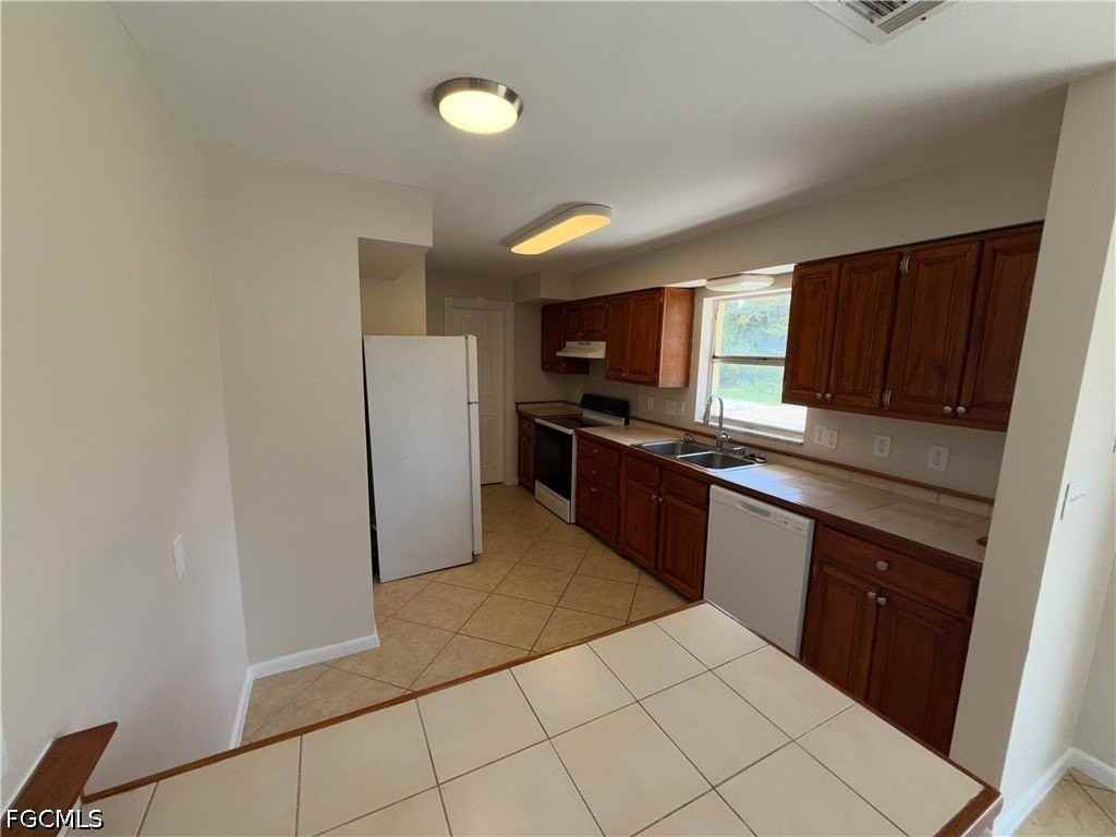 1101 Leeland Heights Blvd E - Photo 6 of 19