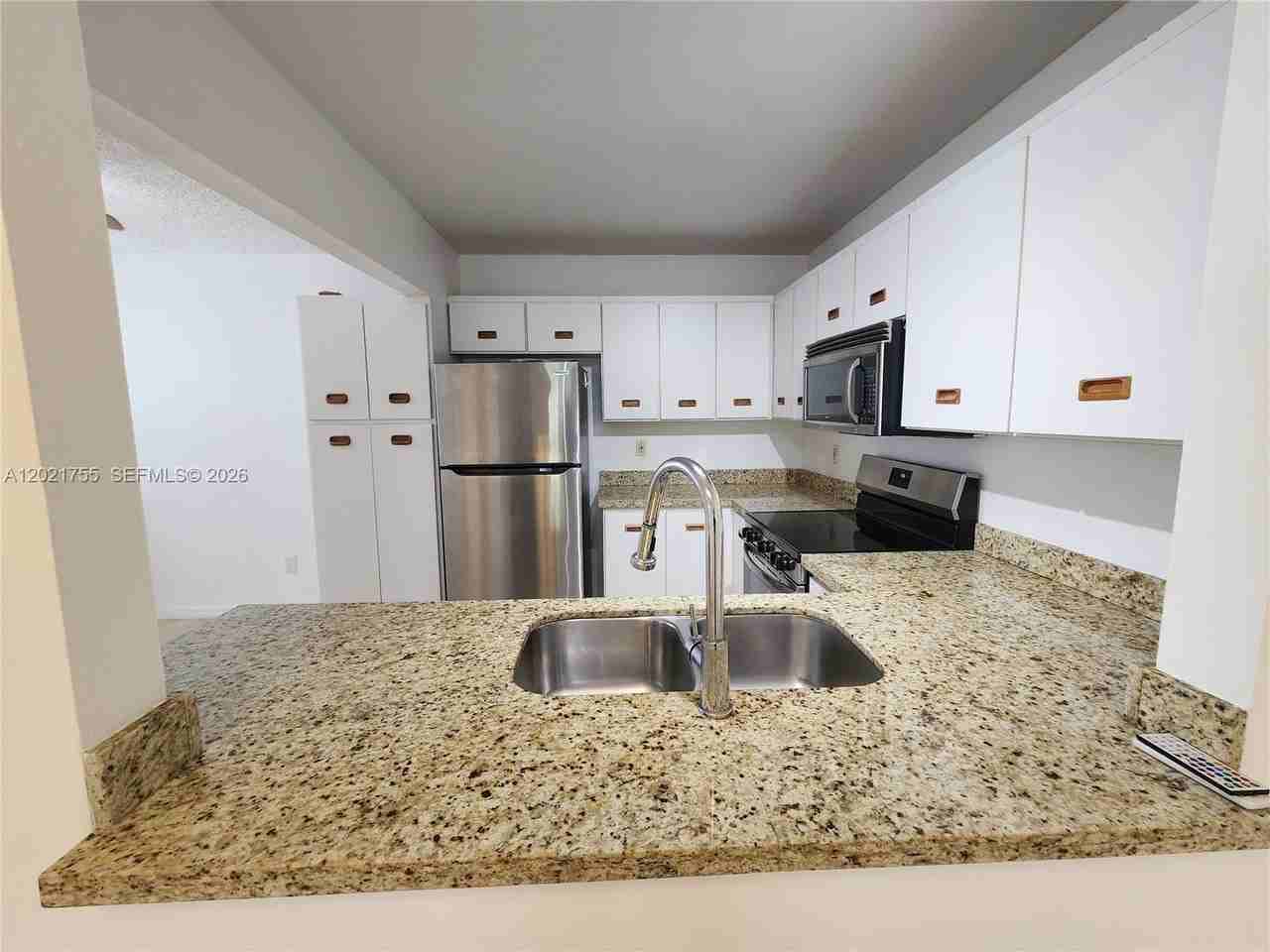 421 Ne 210th Circle Ter #203-26 - Photo 4 of 12