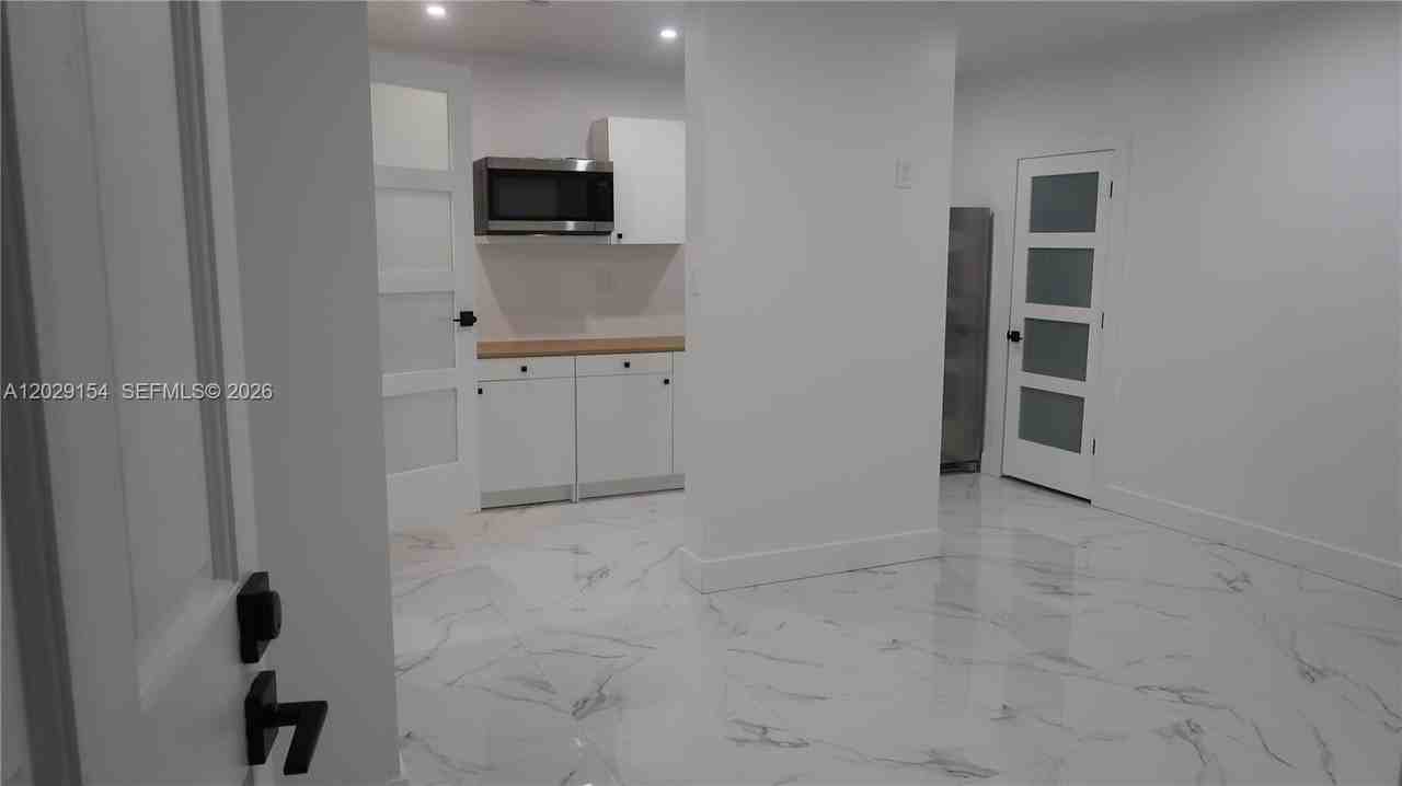 8220 Nw 199th St #1 - Photo 2 of 9