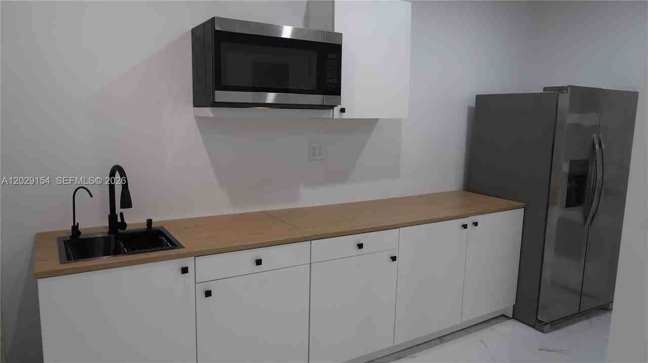 8220 Nw 199th St #1 - Photo 3 of 9