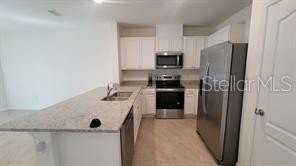1215 Draintree St - Photo 5 of 18