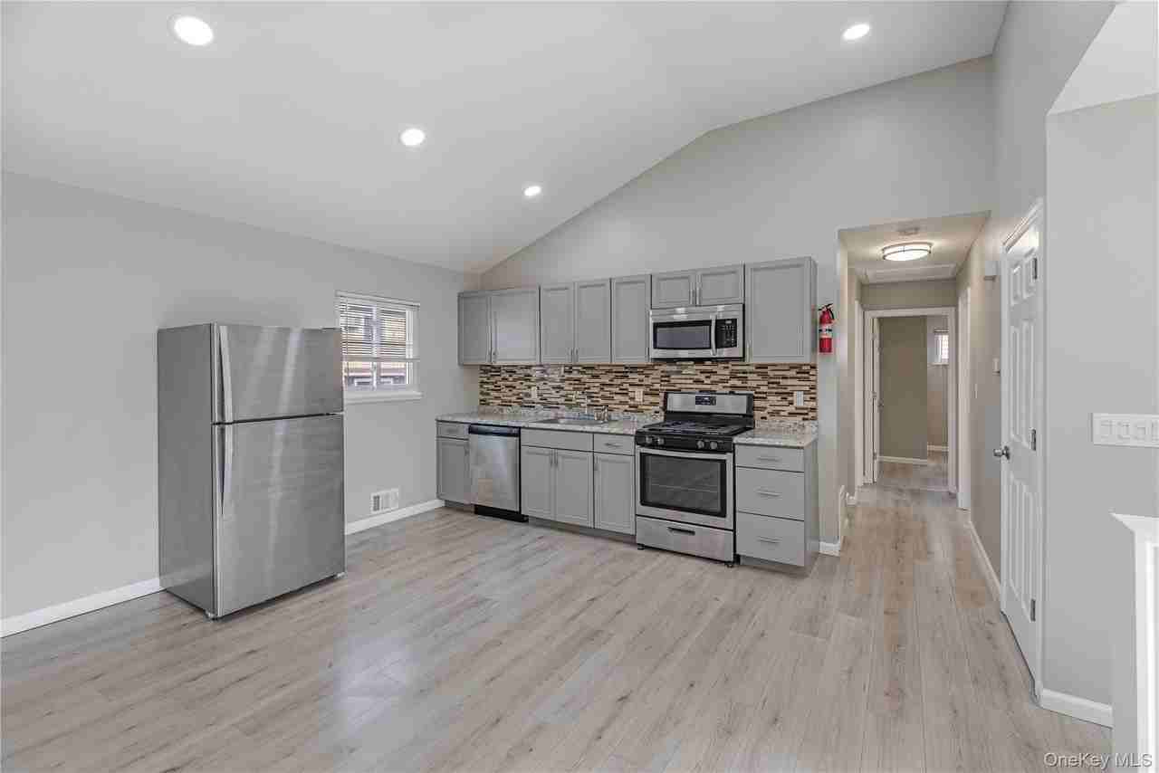 579 Fire Island Ave - Photo 3 of 11