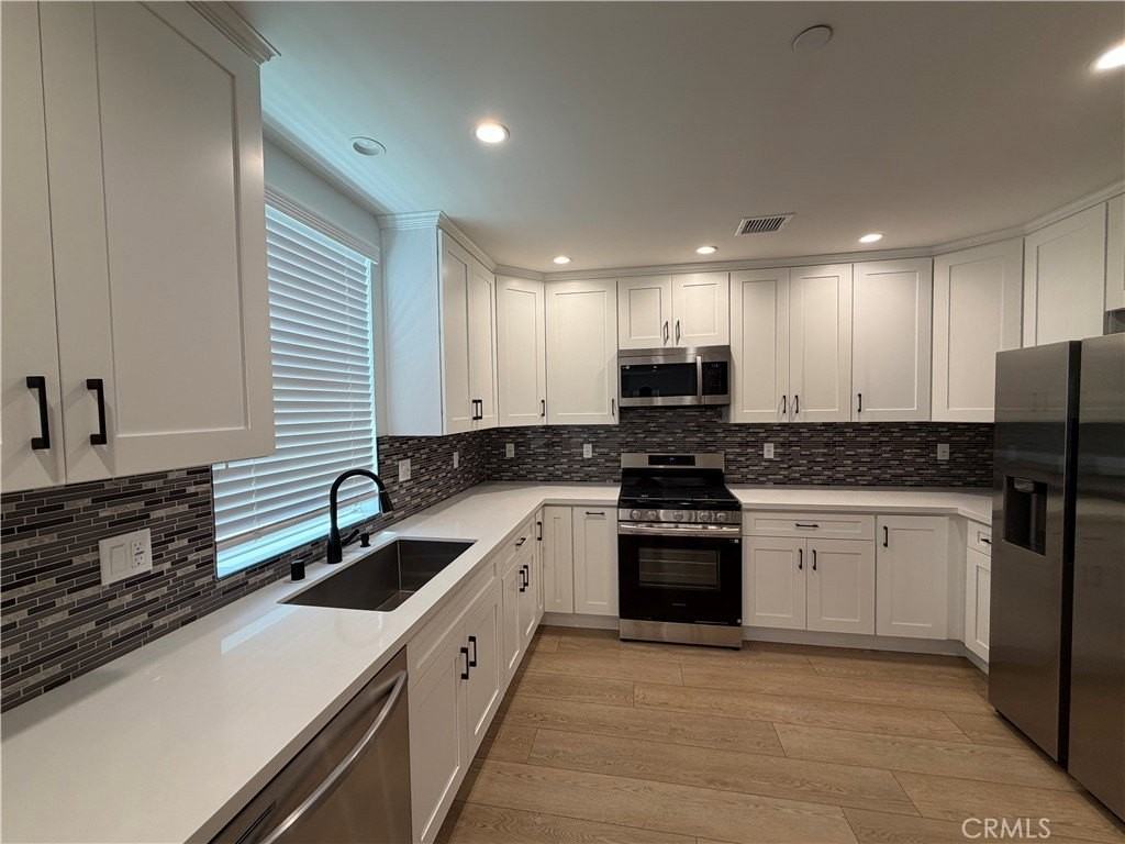 8437 Calvin Ave - Photo 4 of 17