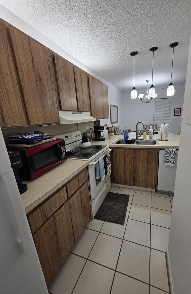 3402 Gardens East Dr #14A - Photo 5 of 14