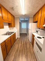 featured image of E 6th St