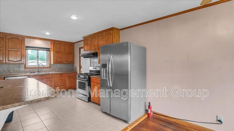 4956 S Maybelle Ave - Photo 3 of 15
