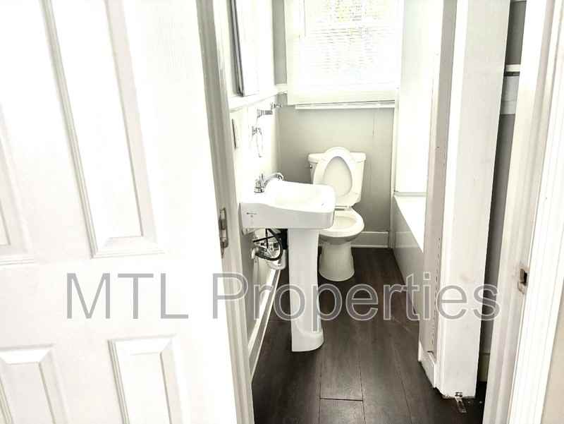 2239 Center St - Photo 7 of 11