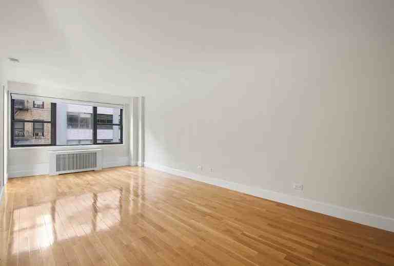 E 33rd St #13B - Photo 2 of 6