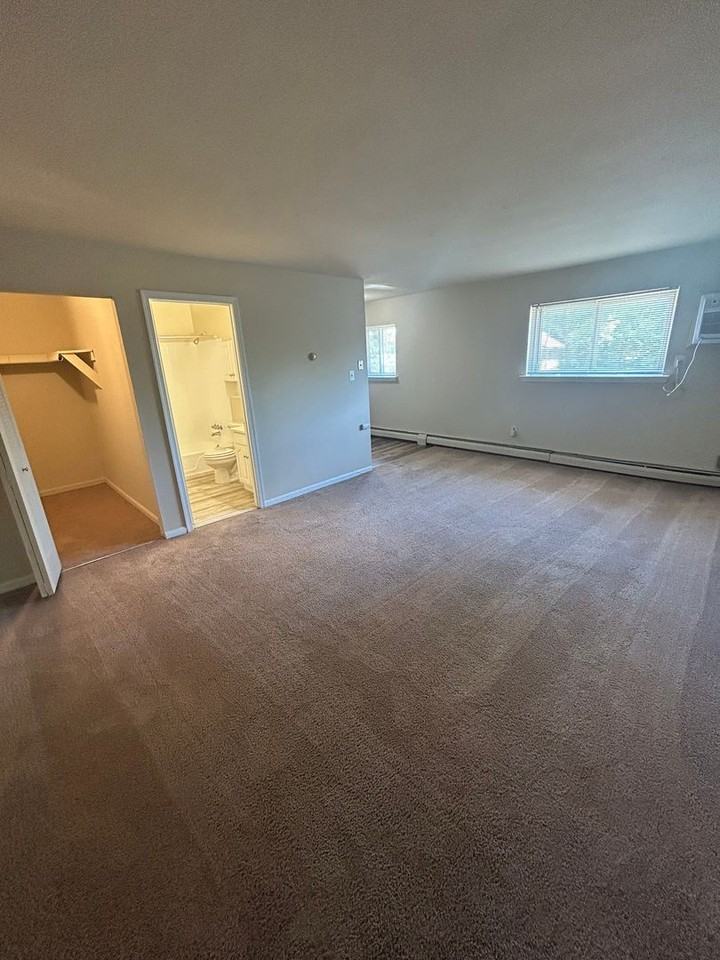HOLLY GARDEN APARTMENTS - Photo 2 of 6