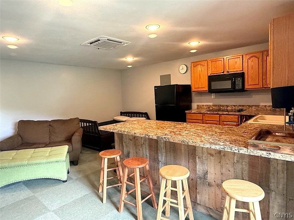 7118 State Route 3 Apt B - Photo 3 of 6
