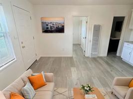 featured image of 402 402 Orange Avenue│1209-1211 E. 4th Street