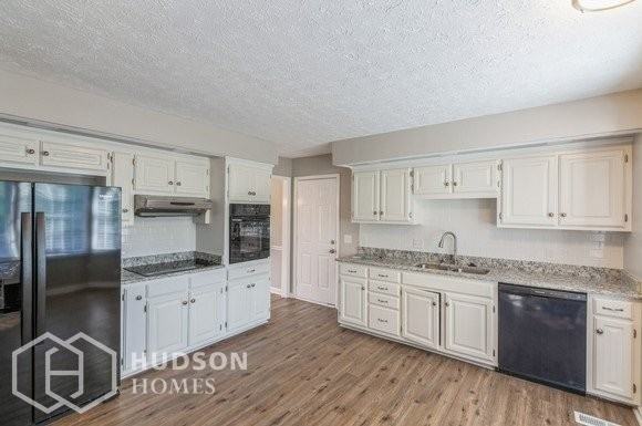 7509 Rolling River Pkwy - Photo 7 of 17