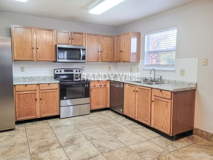 5611 Olive Branch Way - Photo 5 of 13