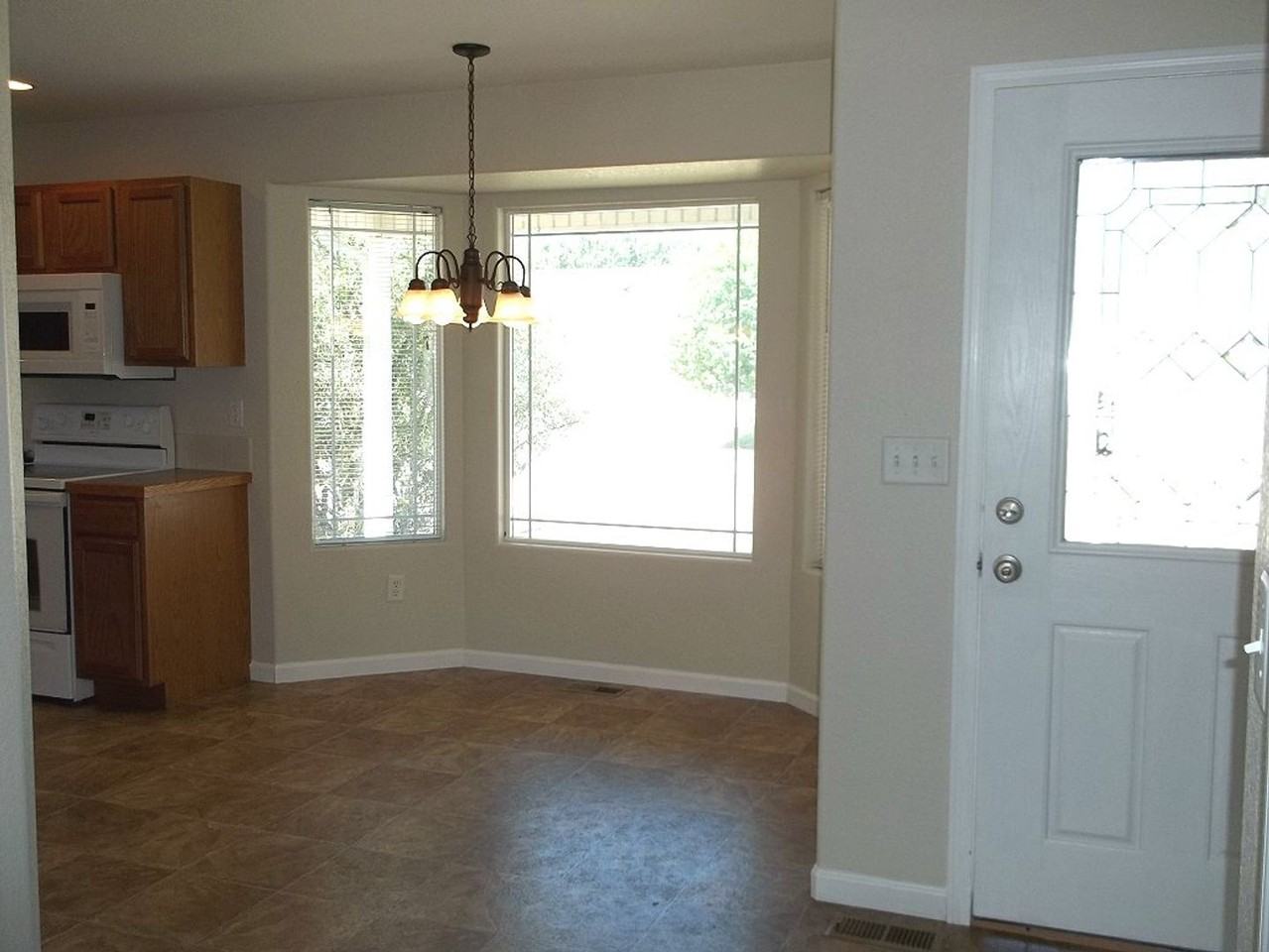 6936 Raleigh St - Photo 2 of 8