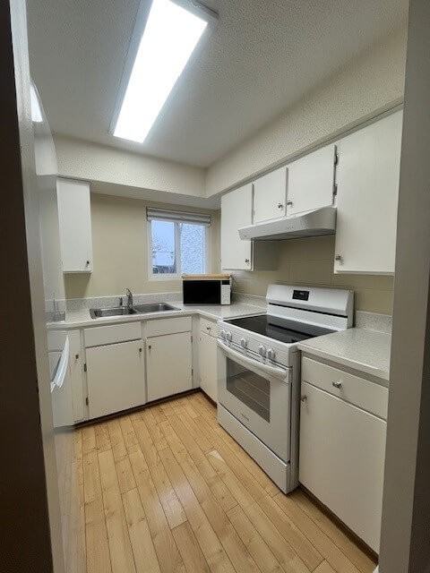 1957 Plateau Gardens #1 - Photo 3 of 25