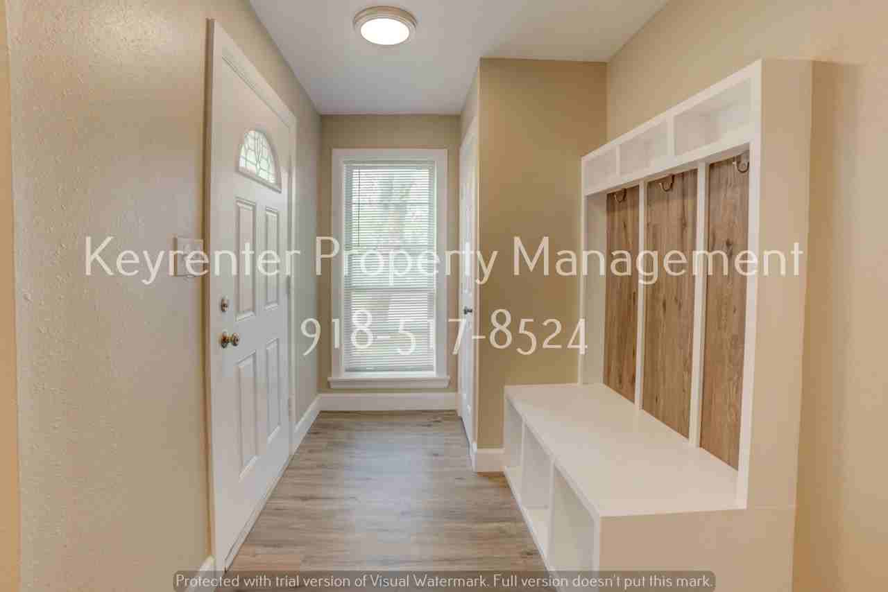 11621 N 103rd East Ave - Photo 2 of 35