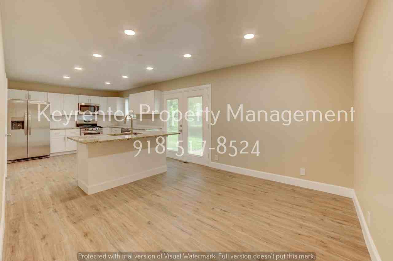 11621 N 103rd East Ave - Photo 3 of 35