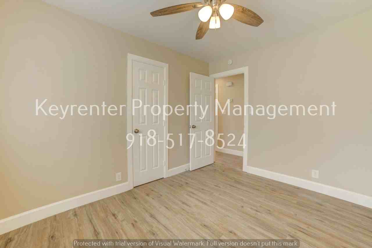 11621 N 103rd East Ave - Photo 6 of 35