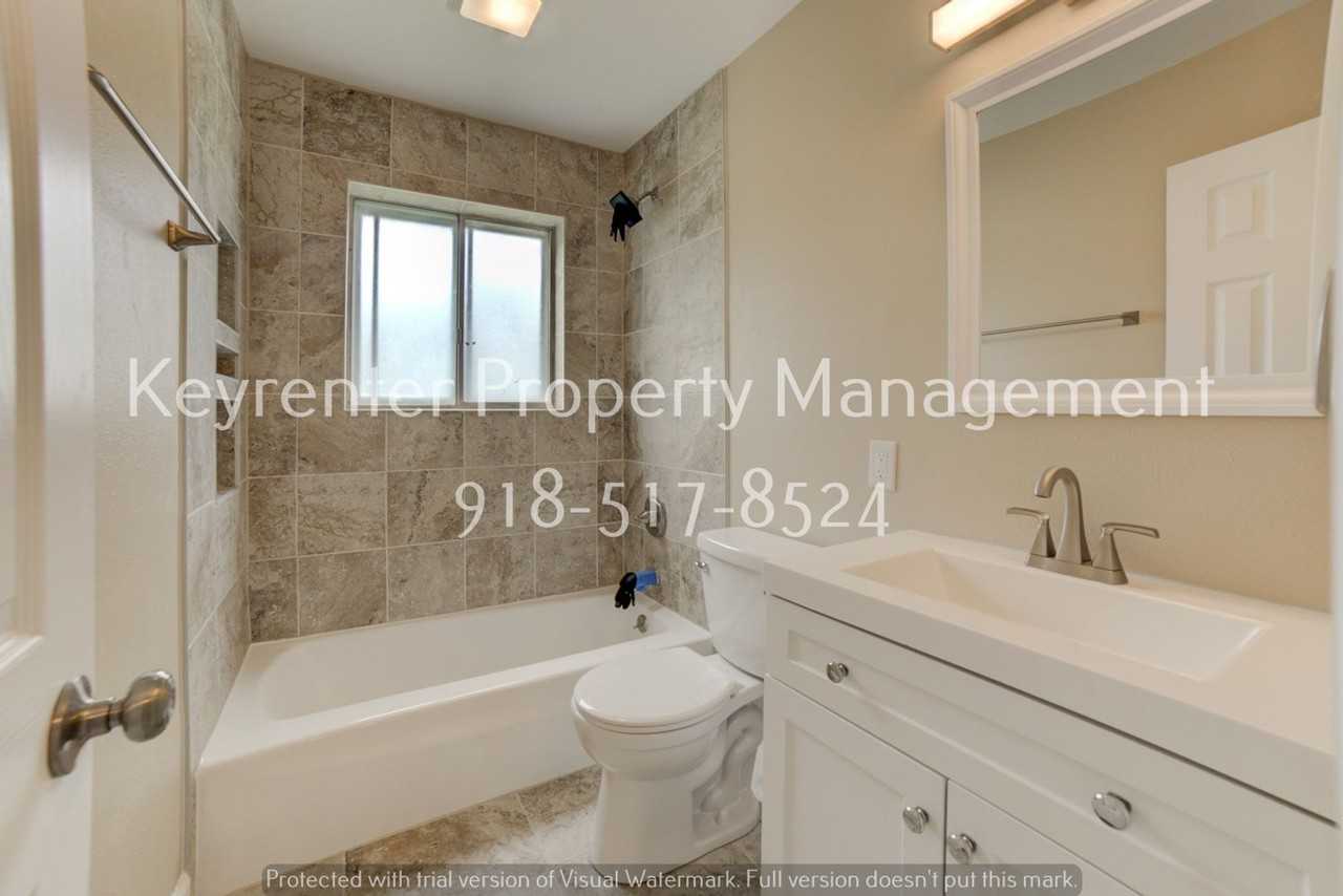 11621 N 103rd East Ave - Photo 7 of 35