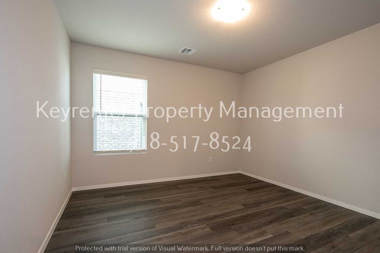 6303 E 123rd St S - Photo 5 of 41