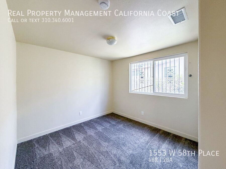 1553 W 58th Pl - Photo 6 of 8