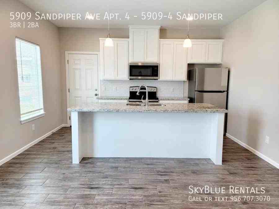5909 Sandpiper Ave Apt 4 - Photo 3 of 12