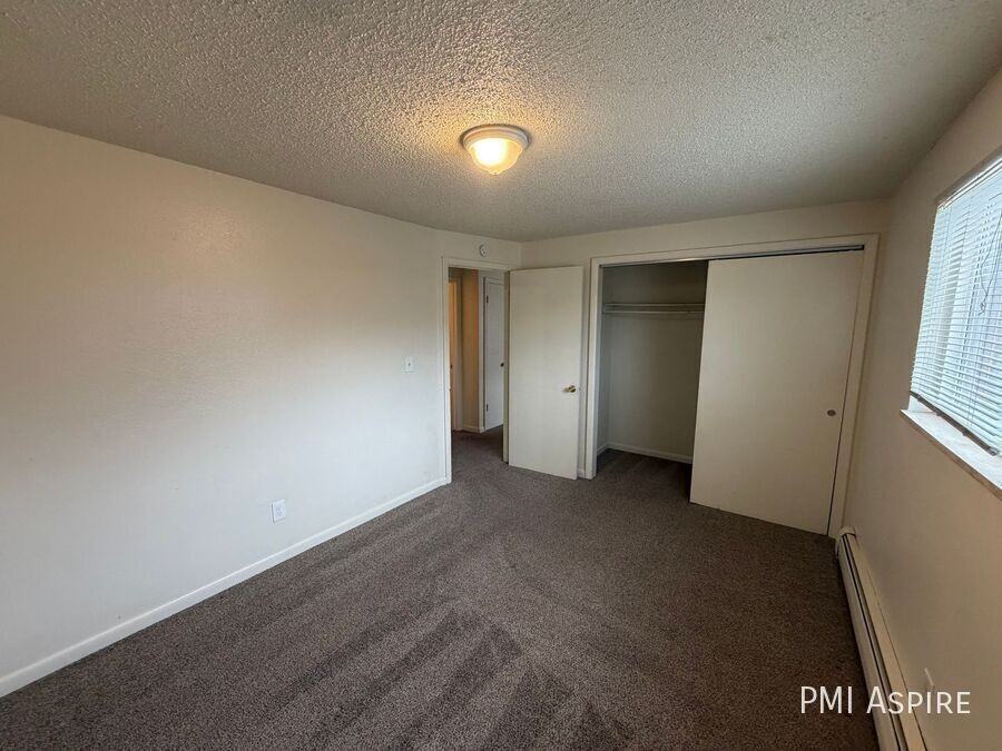 1344 S Coffman St #107 - Photo 6 of 9