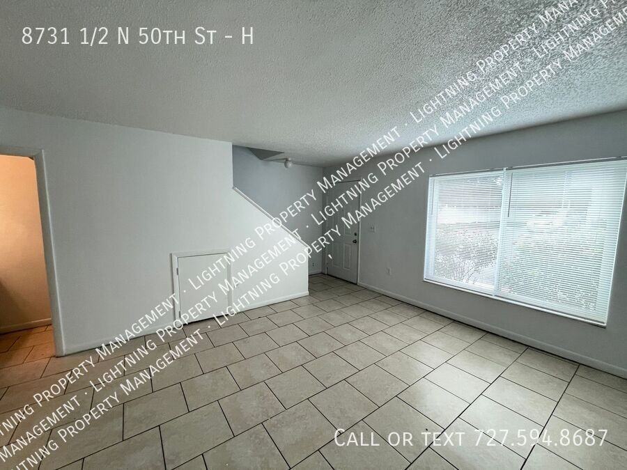8731 1/2 N 50th St #H - Photo 4 of 25