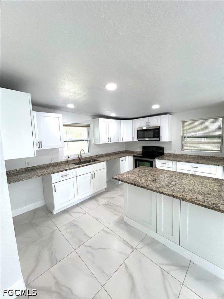 121 E 3rd St - Photo 4 of 11