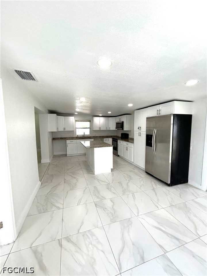 121 E 3rd St - Photo 5 of 11