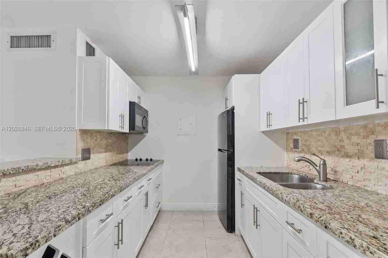 10748 N Kendall Dr #N22 - Photo 7 of 21