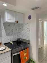 386 Se 3rd St - Photo 7 of 8