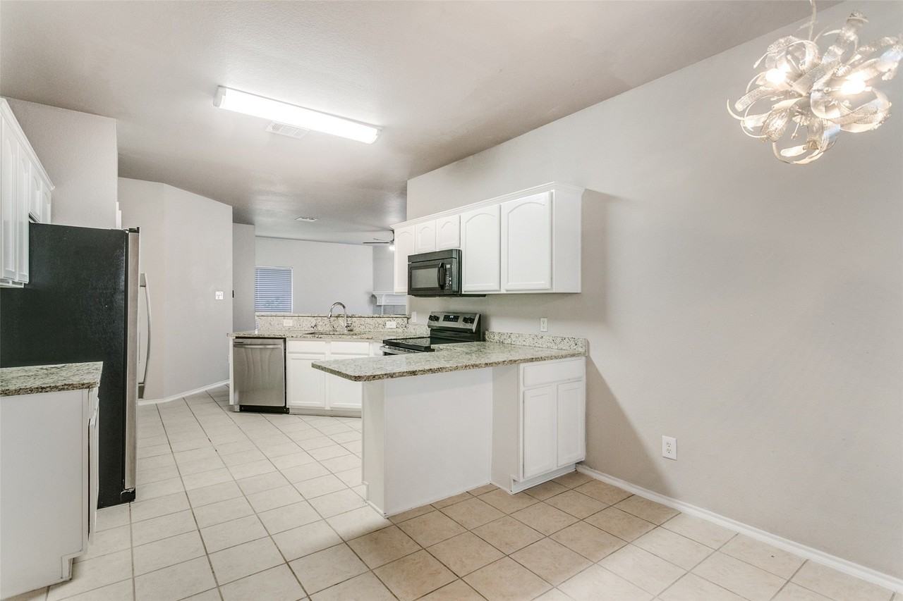 9705 Hedge Bell Dr - Photo 4 of 24