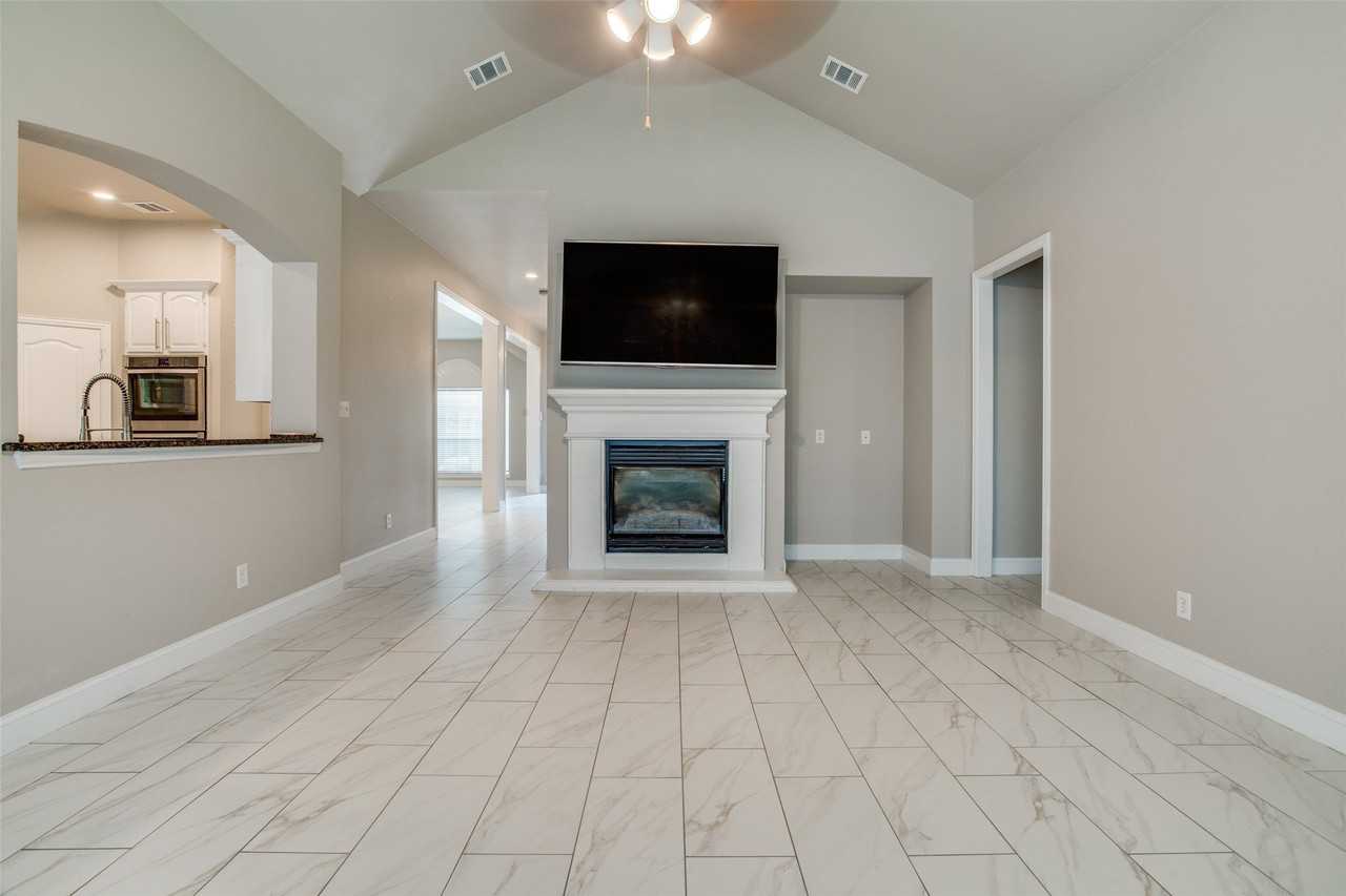7006 Woodsprings Dr - Photo 4 of 13