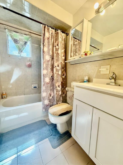 1348 63rd St #5 - Photo 2 of 7