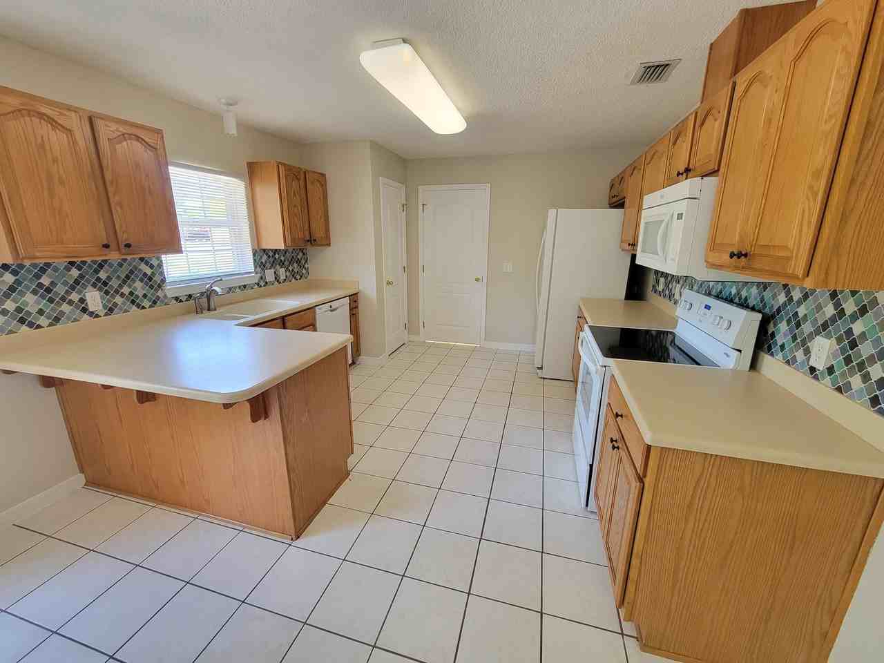 6592 Codell St - Photo 5 of 25