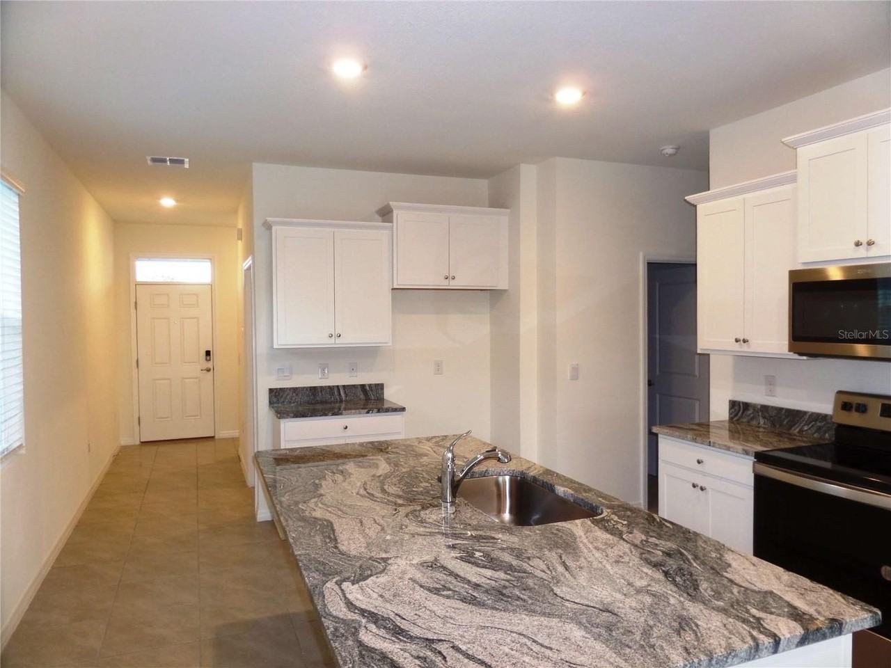 7980 Penrose Pl - Photo 5 of 41
