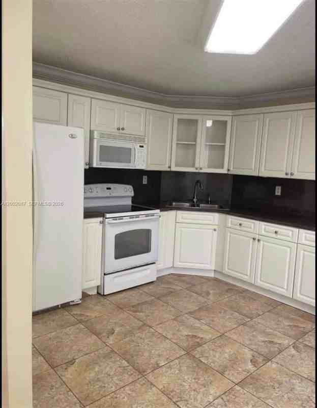 6795 Sw 132nd Ave ##203 - Photo 3 of 3