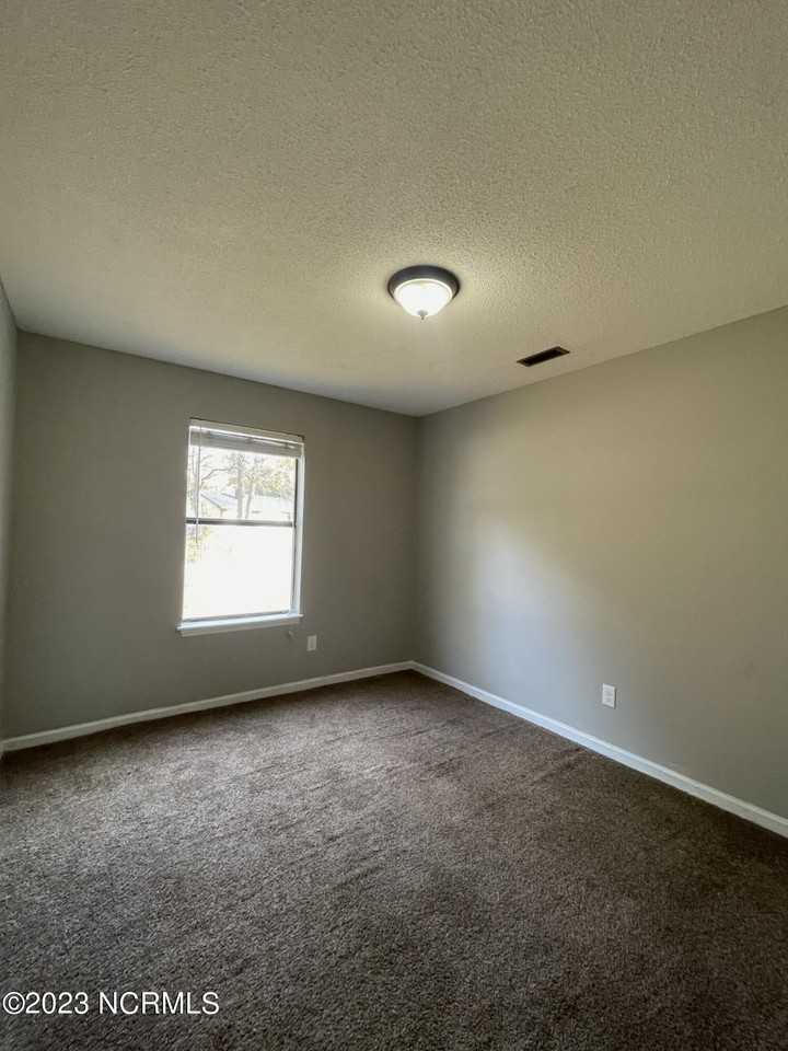 1002 Stillwood Cir - Photo 2 of 16